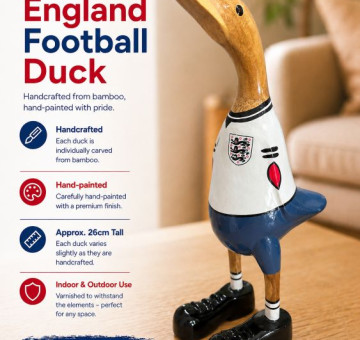 an image of a handcarved and hand painted bamboo duck with the character of a scottish rugby player
