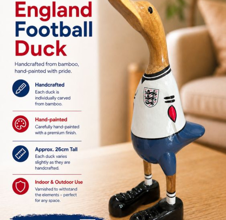 an image of a handcarved and hand painted bamboo duck with the character of a scottish rugby player