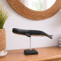 a hand carved and hand painted whale