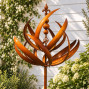 The Stanton Metal Garden Wind Spinner on a stake
